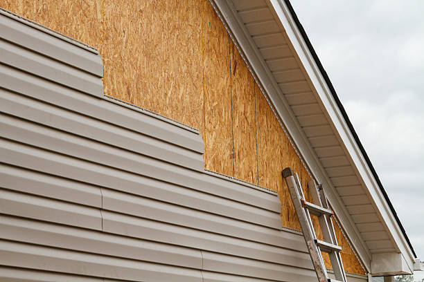 Professional Wood Siding technician working in Reading, MA
